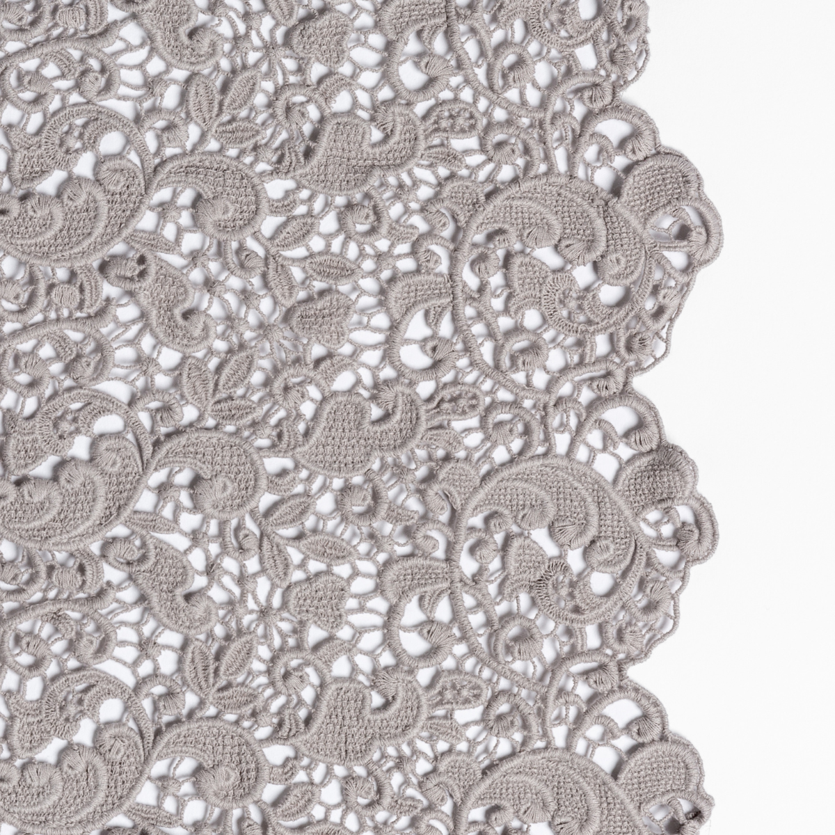 Close-up of Bella Notte Allora bed scarf in Fog, showing intricate floral crochet lace edge detail.