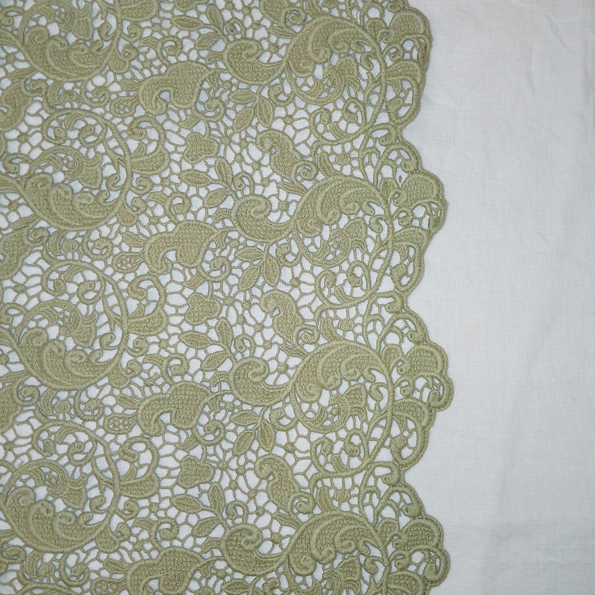 Close-up of Desert Sage lace trim detail on Bella Notte Allora bed scarf against ivory fabric.