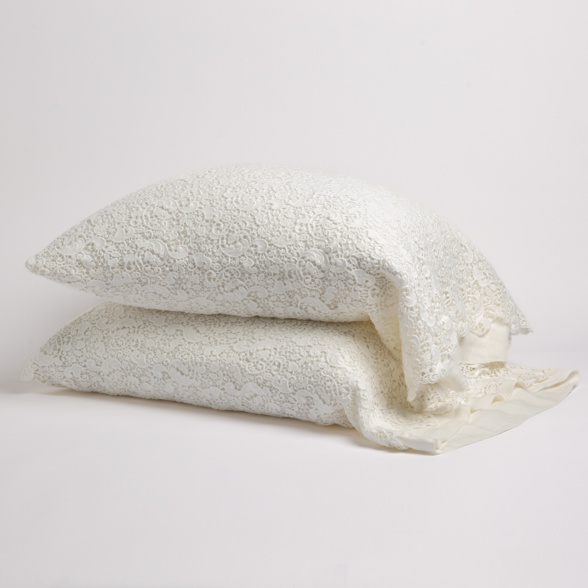 Bella Notte Allora Lace pillowcase in Winter White, stacked pair with delicate lace detailing.