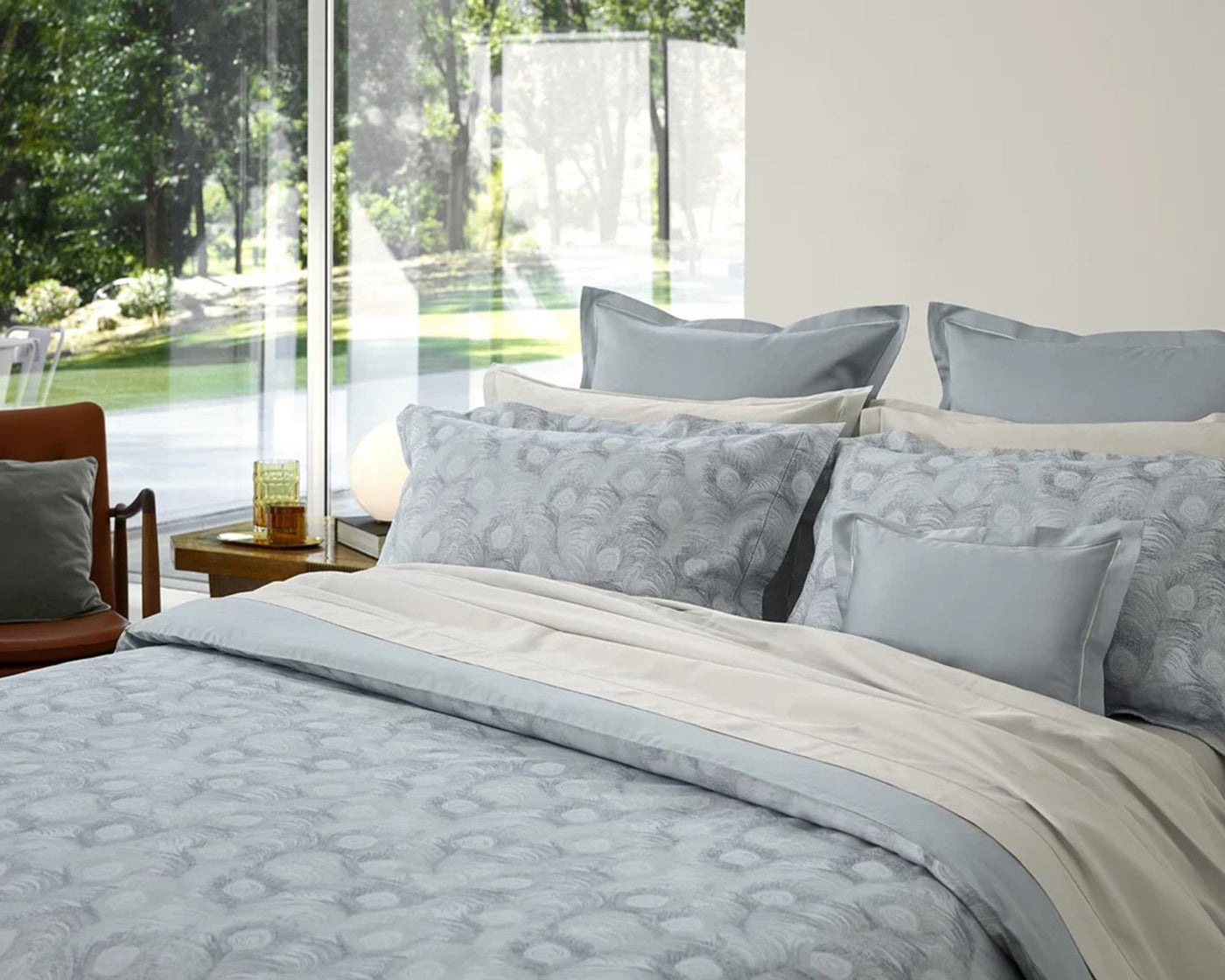 Image of Amalia Home Cristal in Amazonite on a full bed.