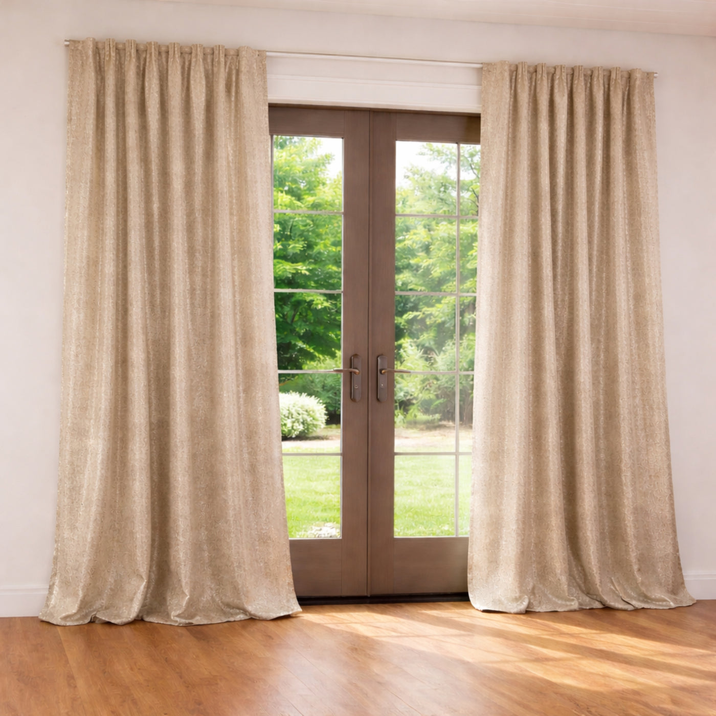 Ann Gish Aura curtain panels in natural linen, floor-length drape beside French doors.