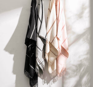 Photo of the Amelia Stripe Throw ensemble.