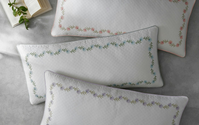 Photo of the Daphne Matelassé | Decorative Pillow Sham ensemble.