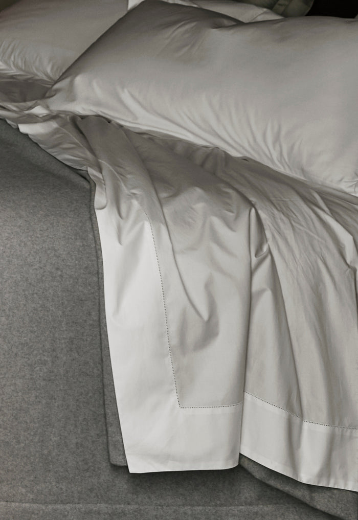 Photo of the Gatsby Hemstitch | Flat Sheet ensemble.