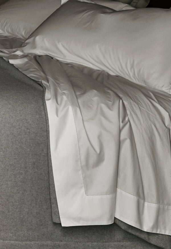 Photo of the Gatsby Hemstitch | Flat Sheet ensemble.