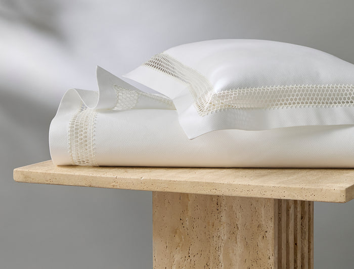 Photo of the Cecily | Lace Piqué Coverlet ensemble.