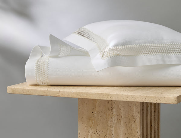 Photo of the Cecily | Lace Piqué Coverlet ensemble.