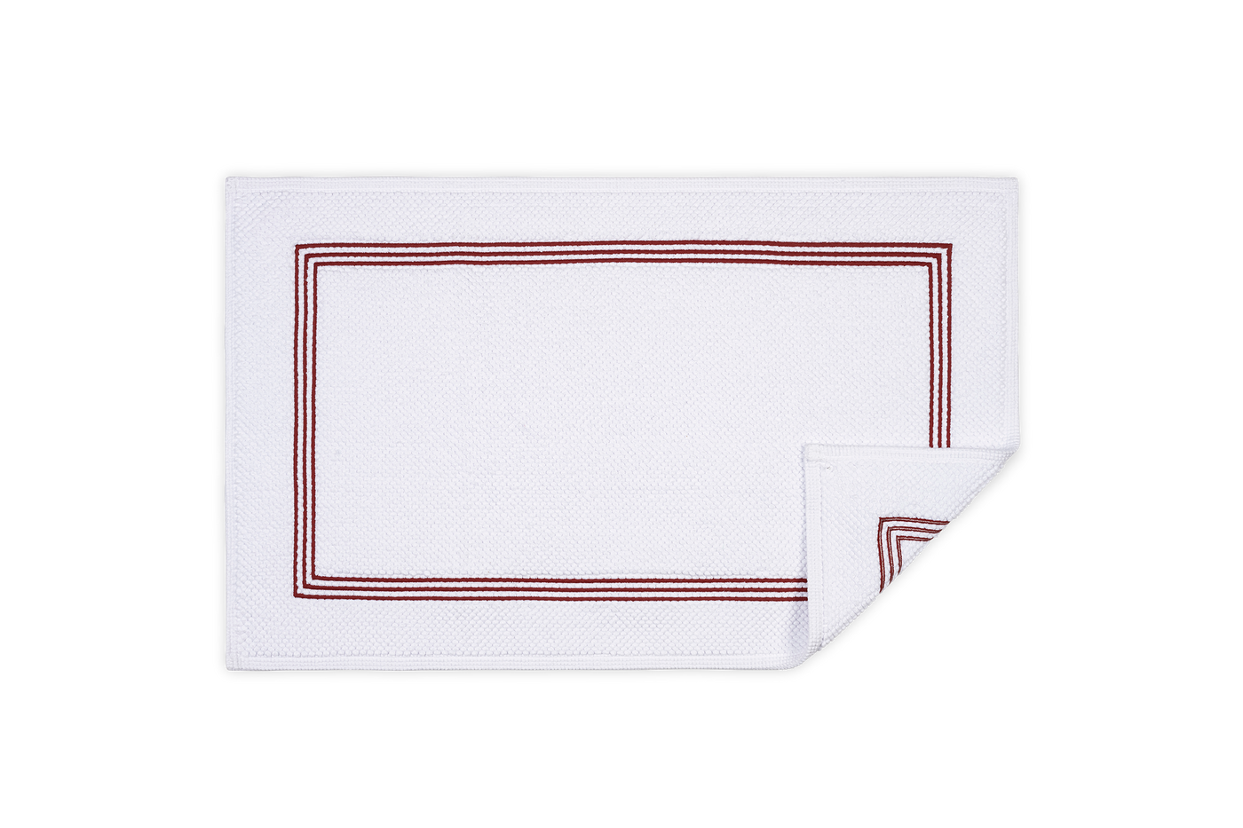 Close-up of crimson triple-stripe border detail on white Bel Tempo bath rug corner.