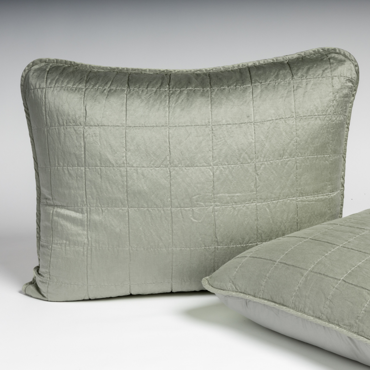 Eucalyptus velvet sham with grid quilting, shown upright with second sham in foreground.