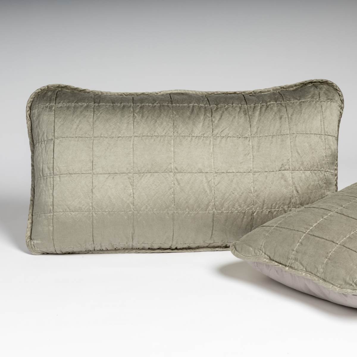 Bella Notte Sel sham in Fog, close-up showing quilted grid stitching on lustrous velvet.