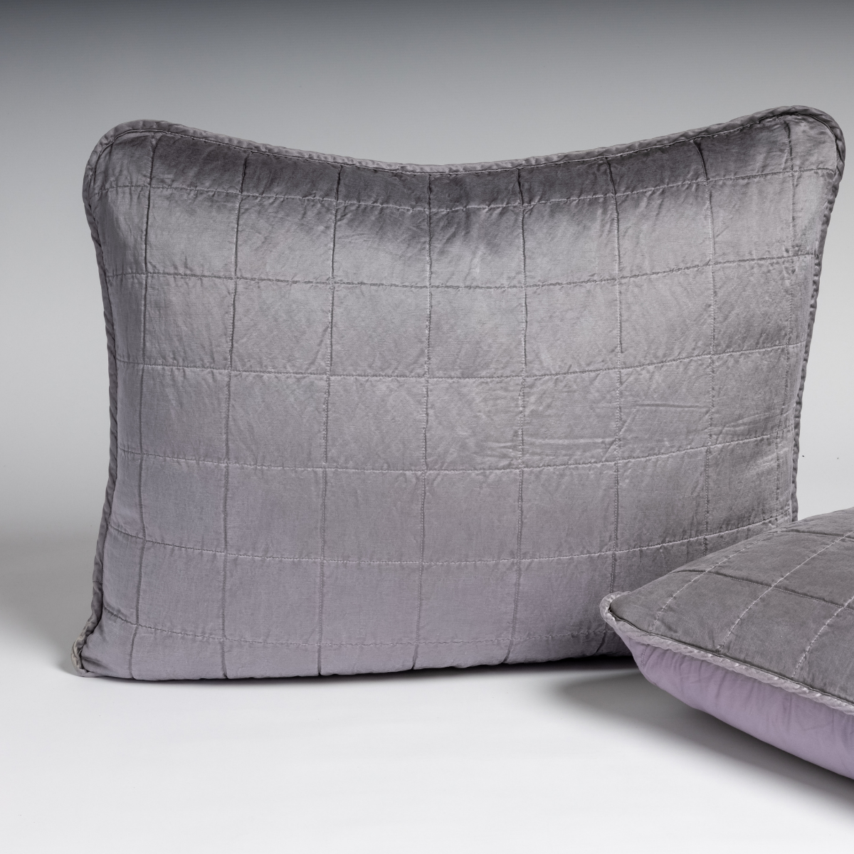 Bella Notte Sel sham in French Lavender, quilted grid stitching on silk-like fabric, flanged edge.