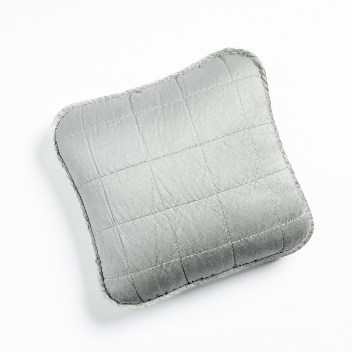Quilted Cloud throw pillow with soft sheen and rounded square silhouette, top view.