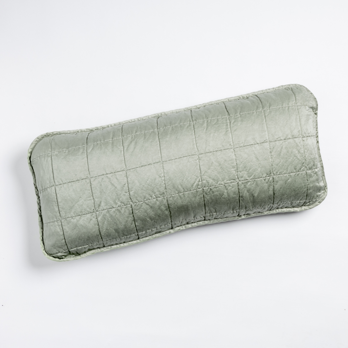 Eucalyptus quilted lumbar throw pillow with grid stitching and satin sheen, angled view.