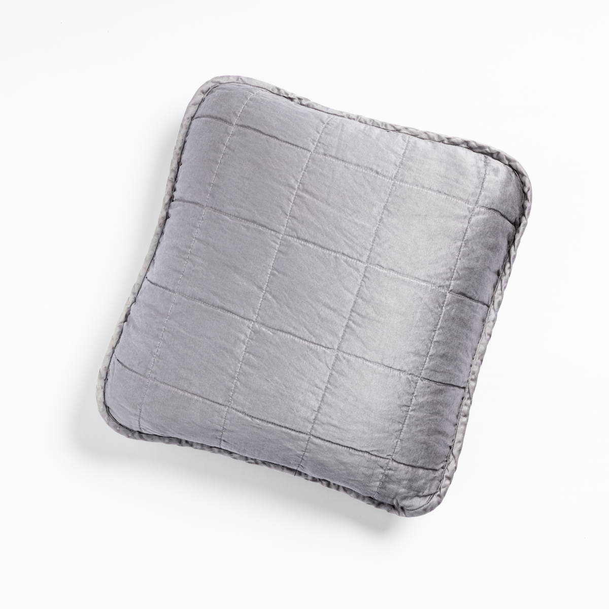Bella Notte Sel throw pillow in French Lavender, quilted grid stitching on lustrous fabric, top-down view.