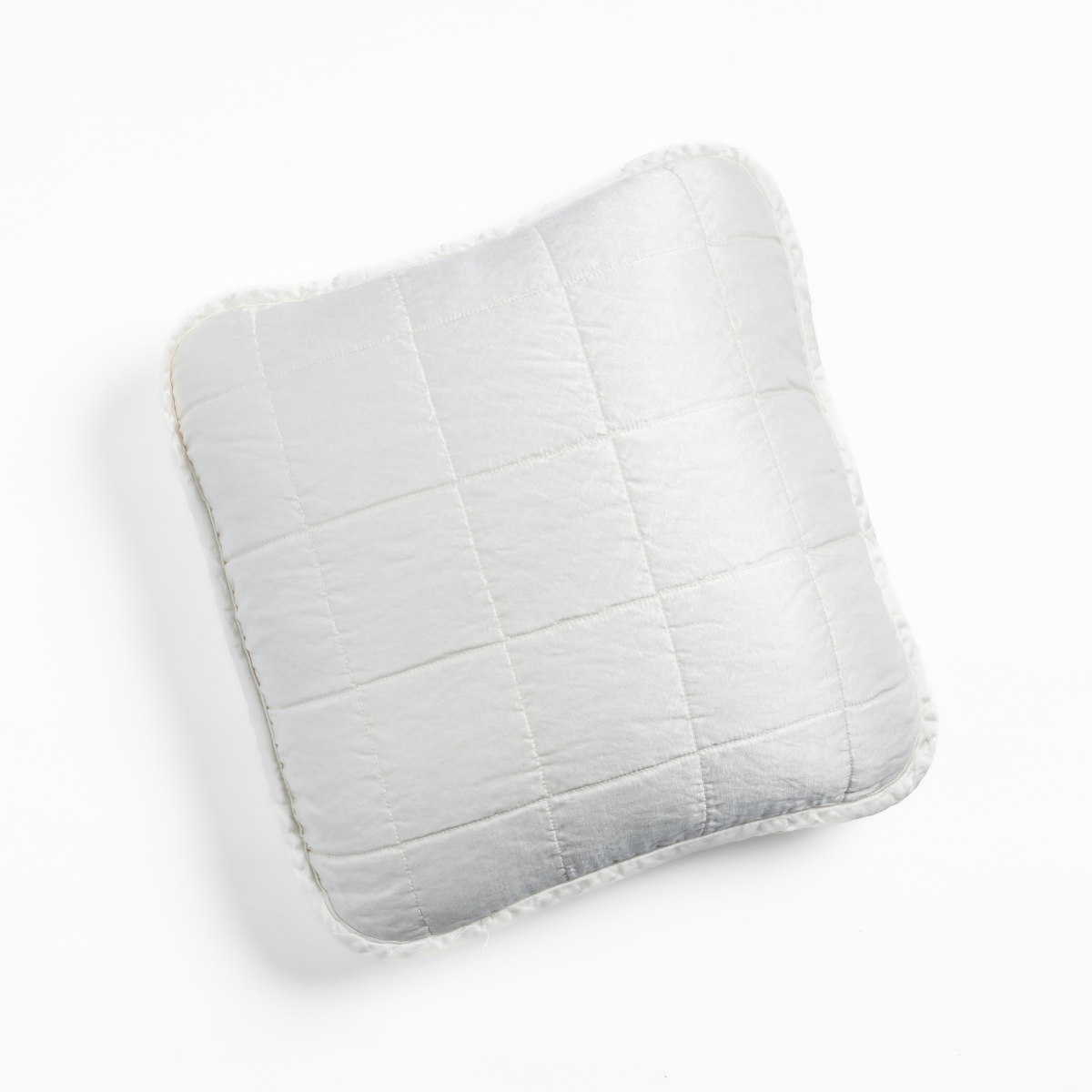 Bella Notte Sel throw pillow in White with diamond quilting and ruffled edges.