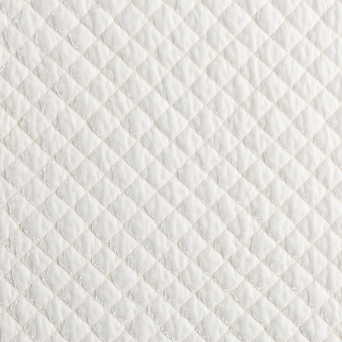 Close-up of Crema silk velvet quilted diamond stitching pattern on Bella Notte sham.