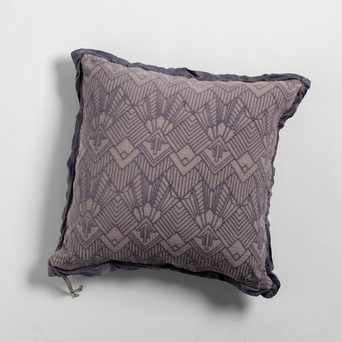 Bella Notte Trettino pillow in French Lavender, Art Deco geometric jacquard pattern with ruffle trim.