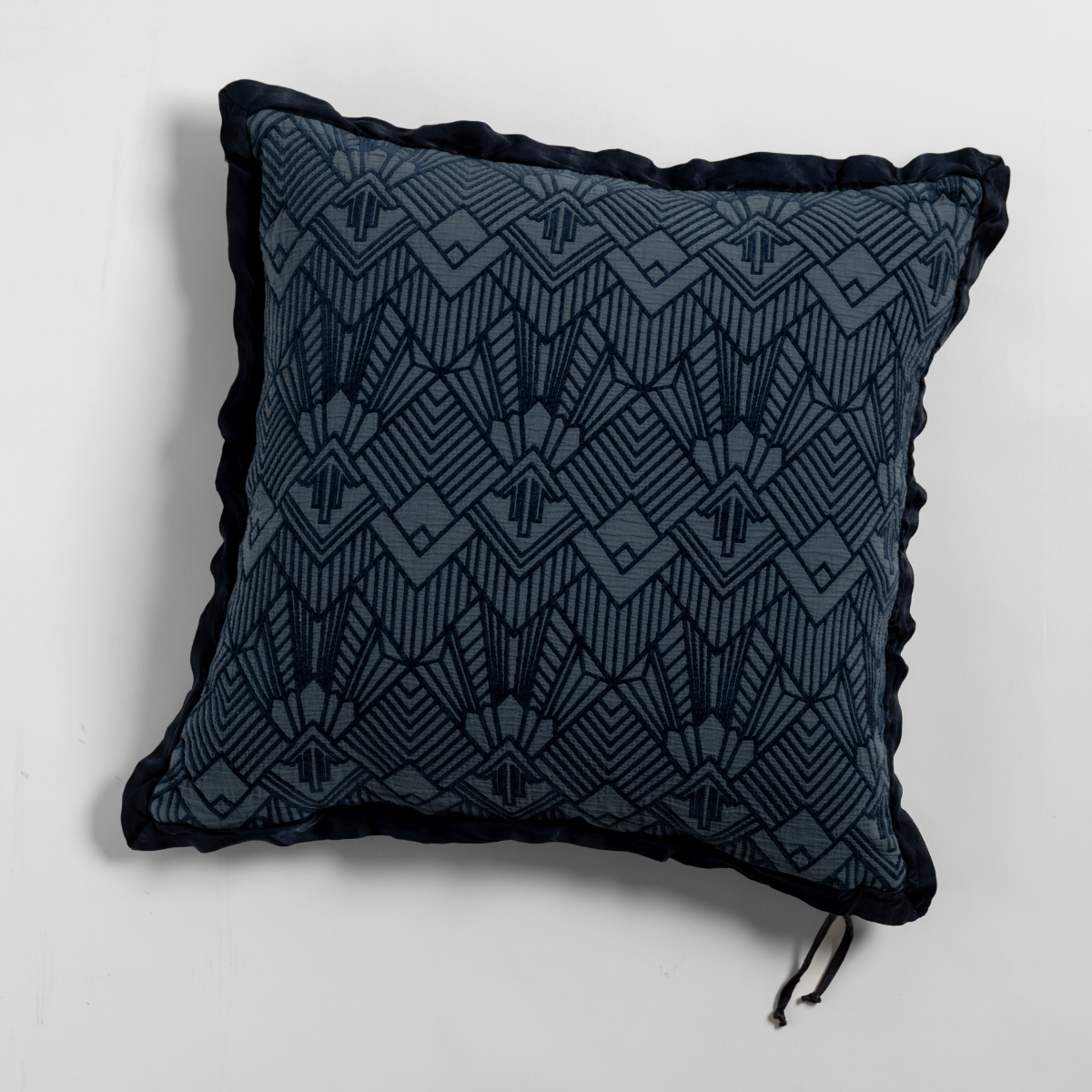 Bella Notte Trettino throw pillow in Midnight, Art Deco geometric pattern with velvet trim.