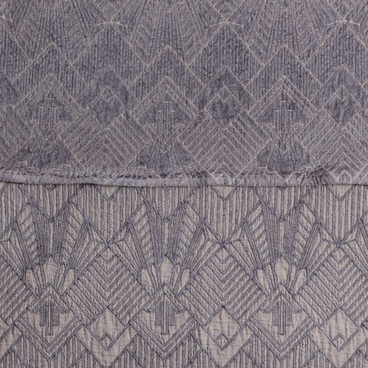 Close-up of Bella Notte Trettino bedspread hem in French Lavender, showing diamond jacquard pattern detail.