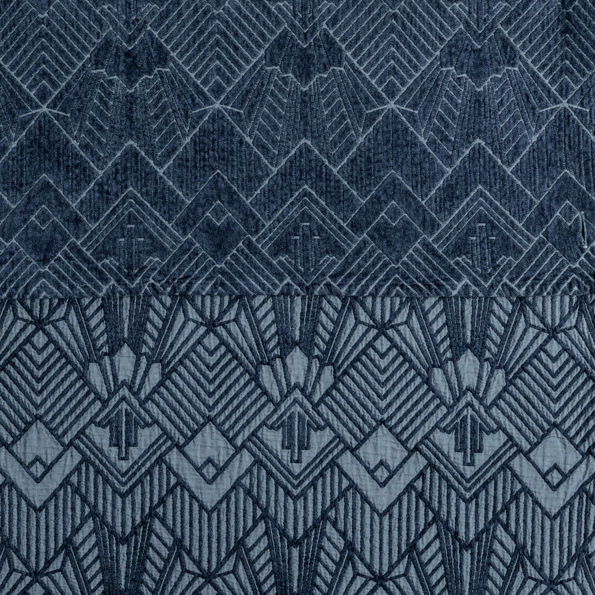 Close-up of Midnight Bella Notte Trettino throw pillow showing Art Deco geometric embroidery detail.
