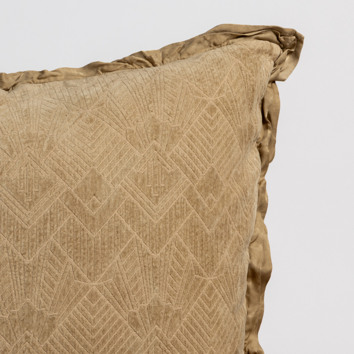 Close-up of Bella Notte Trettino sham corner in Honeycomb, showing geometric diamond jacquard weave and ruffled edge.