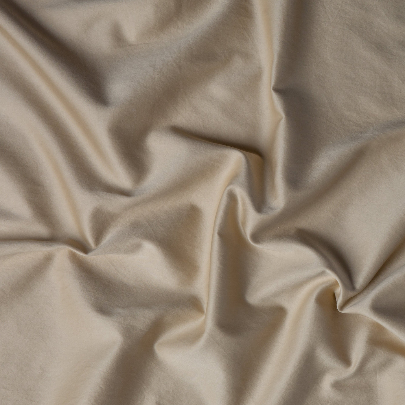 Close-up of Bria duvet cover in Honeycomb, showing smooth fabric drape and texture.