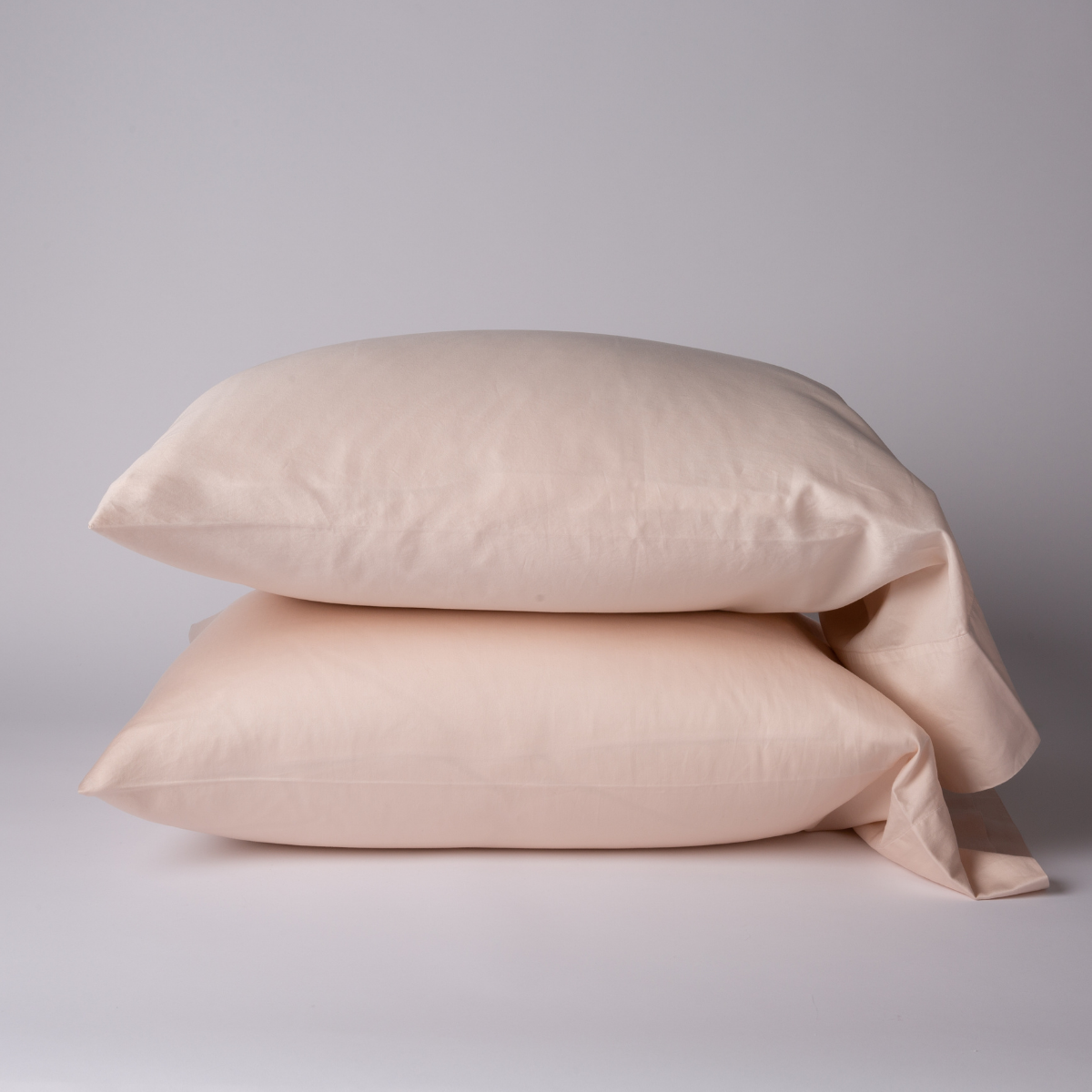 Two Pearl Bella Notte Bria pillowcases stacked, showing soft fabric drape and texture.