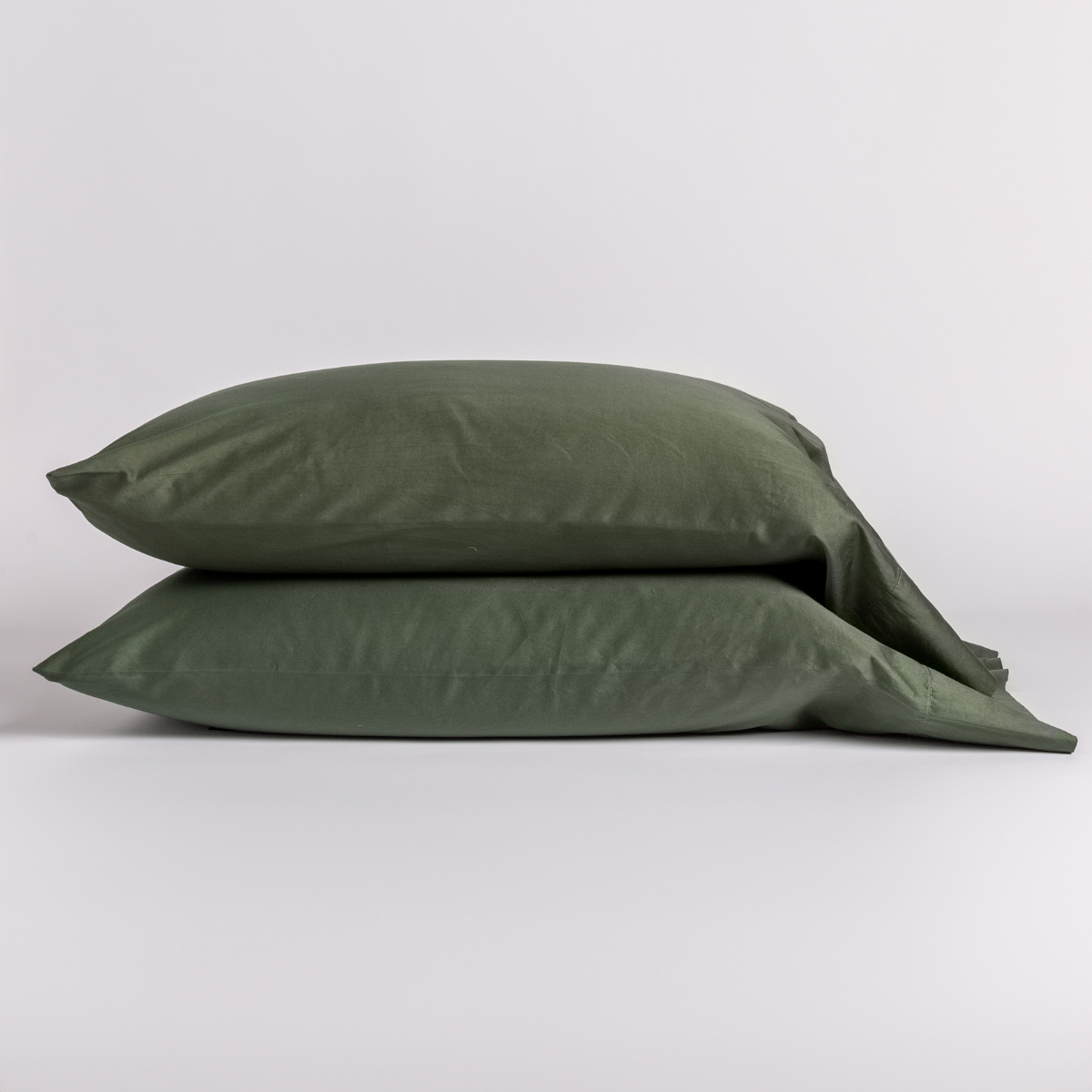 Two Juniper Bella Notte Bria pillowcases stacked, showing smooth sateen finish.