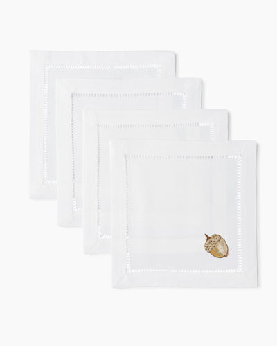 Henry Handwork Acorn Gold white linen cocktail napkins with hemstitch border, set of 4.