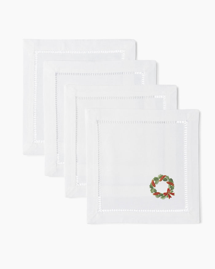 Photo of the Holly Ribbon Wreath Cocktail Napkins ensemble.