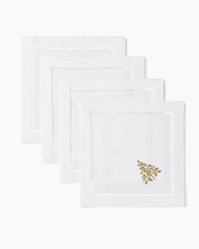 Henry Handwork Mod Tree gold cocktail napkins, white linen with hemstitch border, set of four.