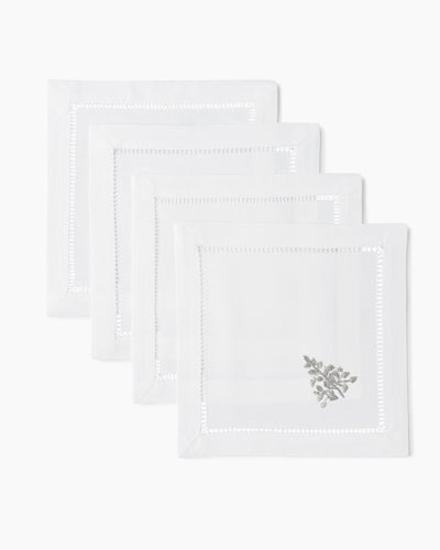 Henry Handwork Mod Tree white linen cocktail napkins with silver embroidery and hemstitch border.