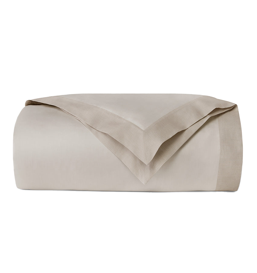 Sferra Carlotta duvet cover in sand, folded to show smooth sateen finish.