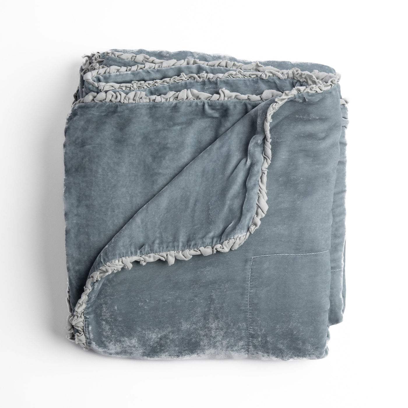 Bella Notte Carmen blanket in Cloud, folded to show ruched trim detail.