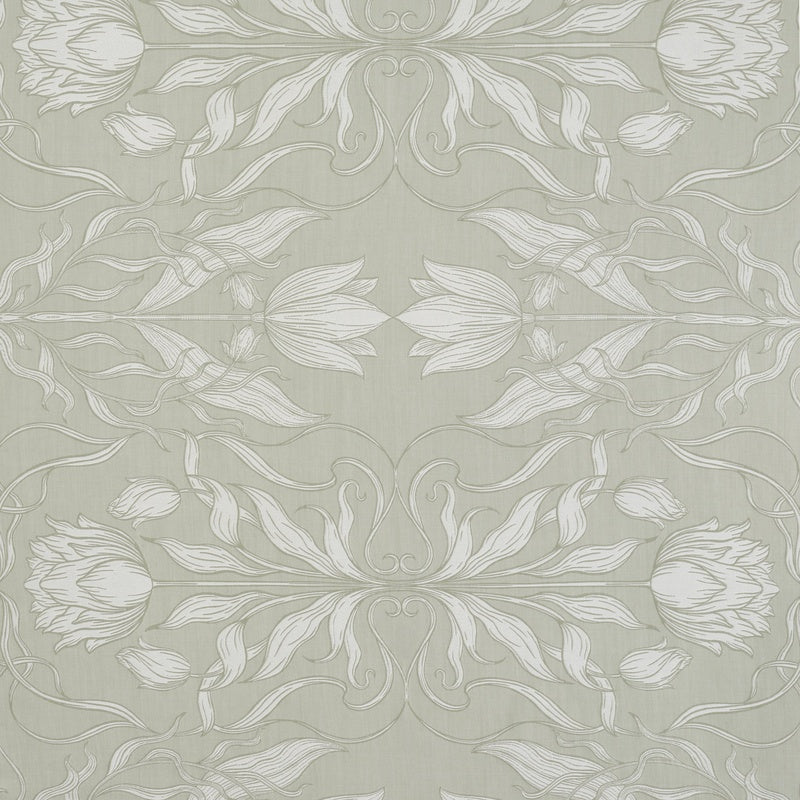 A pale green fabric with a white botanical print featuring tulips and swirling leaves in a symmetrical pattern, featuring Botanica Pillowcase by Celso de Lemos available at Linen Society.
