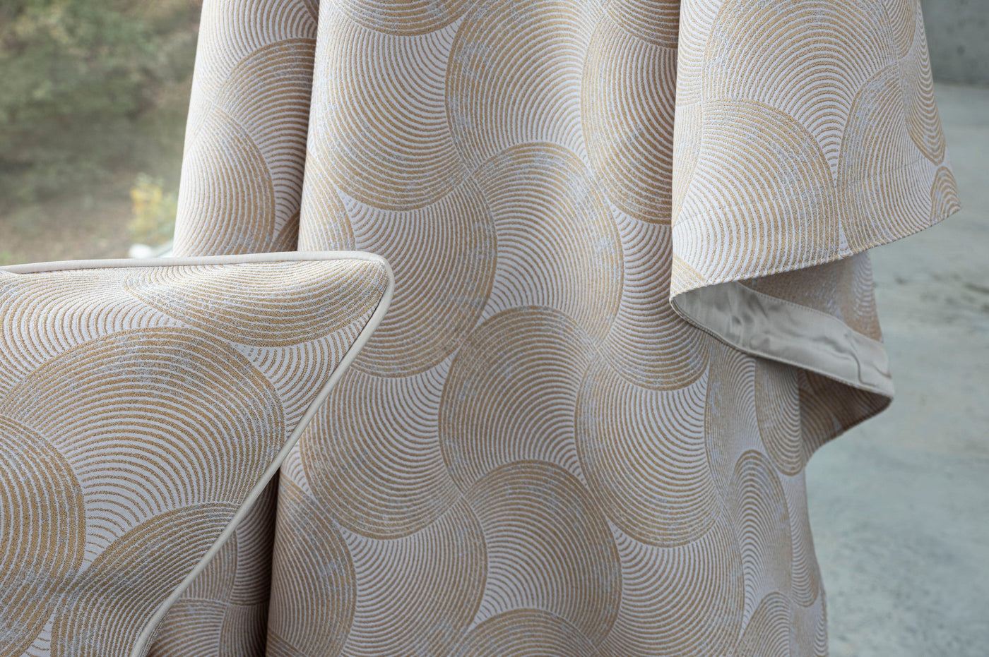 Close-up of a beige and white patterned Pillow Cover with a subtle sheen, featuring the Caviar Pillow Cover by Celso de Lemos available at Linen Society.