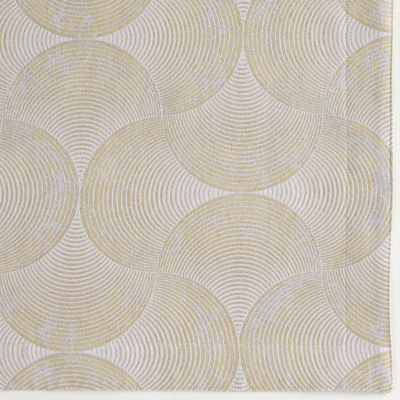 Close-up view of a textured fabric with a geometric pattern of golden fan-shaped circles against a light background, featuring Caviar Pillow Cover by Celso de Lemos available at Linen Society.