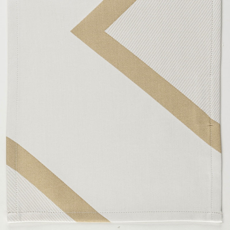 Close-up of a white pillowcase with a subtle ribbed texture and two diagonal gold bands, featuring Charleston Pillowcase by Celso de Lemos available at Linen Society.