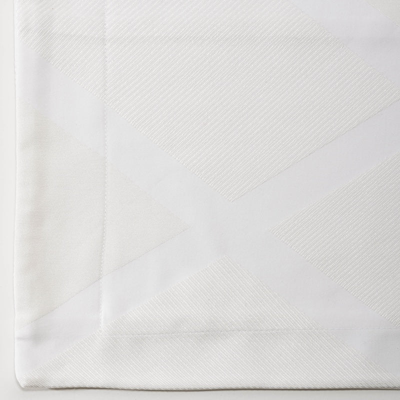 Close-up on white geometric textured fabric, featuring Charleston Pillowcase by Celso de Lemos available at Linen Society.