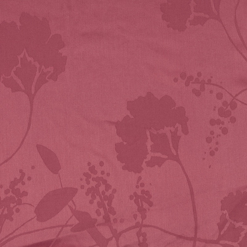 Close-up of a rose-colored textile featuring a tonal floral pattern, featuring Jardim Pillowcase by Celso de Lemos available at Linen Society.