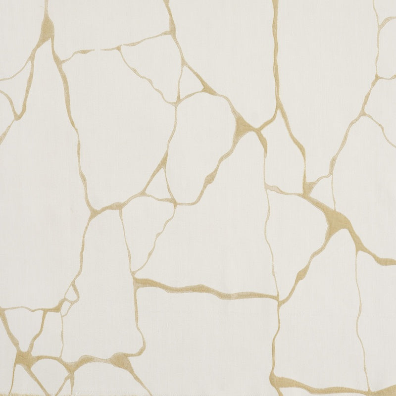 Close-up of a white textile with a delicate, cracked gold pattern. featuring Jessie Pillowcase by Celso de Lemos available at Linen Society.