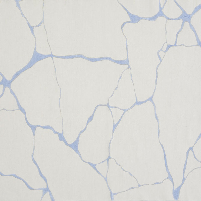 Close-up view of a textured white fabric with a delicate blue abstract pattern, featuring Jessie Pillowcase by Celso de Lemos available at Linen Society.