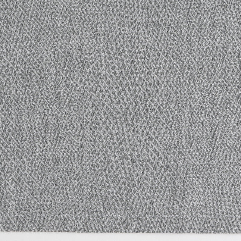 A grey textured fabric with a subtle dot pattern, featuring Kroco Pillowcase by Celso de Lemos available at Linen Society.
