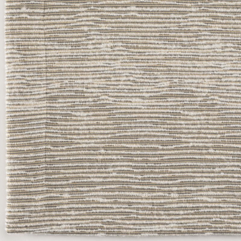 A textured fabric with horizontal stripes in neutral tones, featuring Panama Pillow Cover by Celso de Lemos available at Linen Society.
