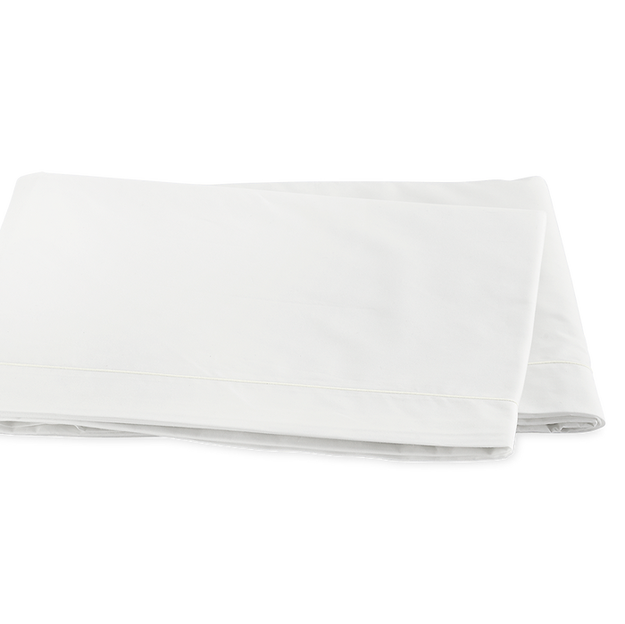 Photo of the Ceylon Satin Stitch | Flat Sheet ensemble.