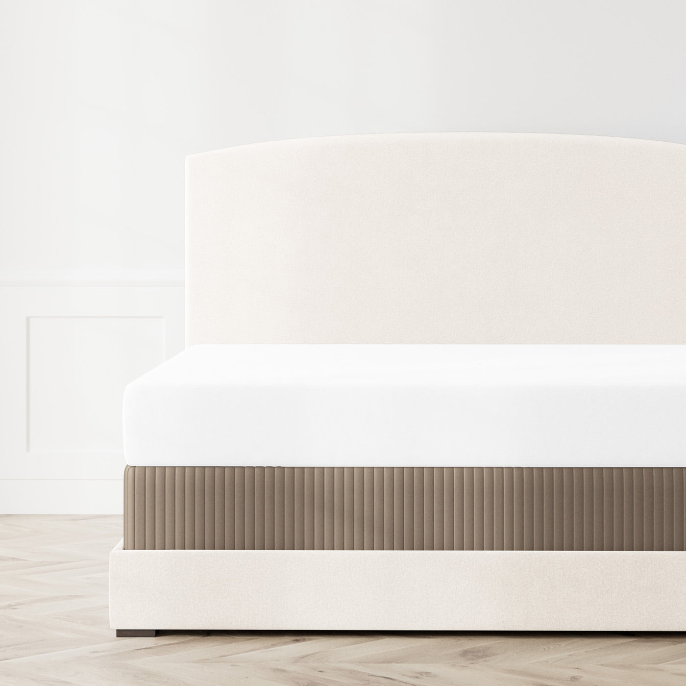 Ann Gish Charmeuse Channel Quilt box spring cover in taupe, pleated detail on styled bed.