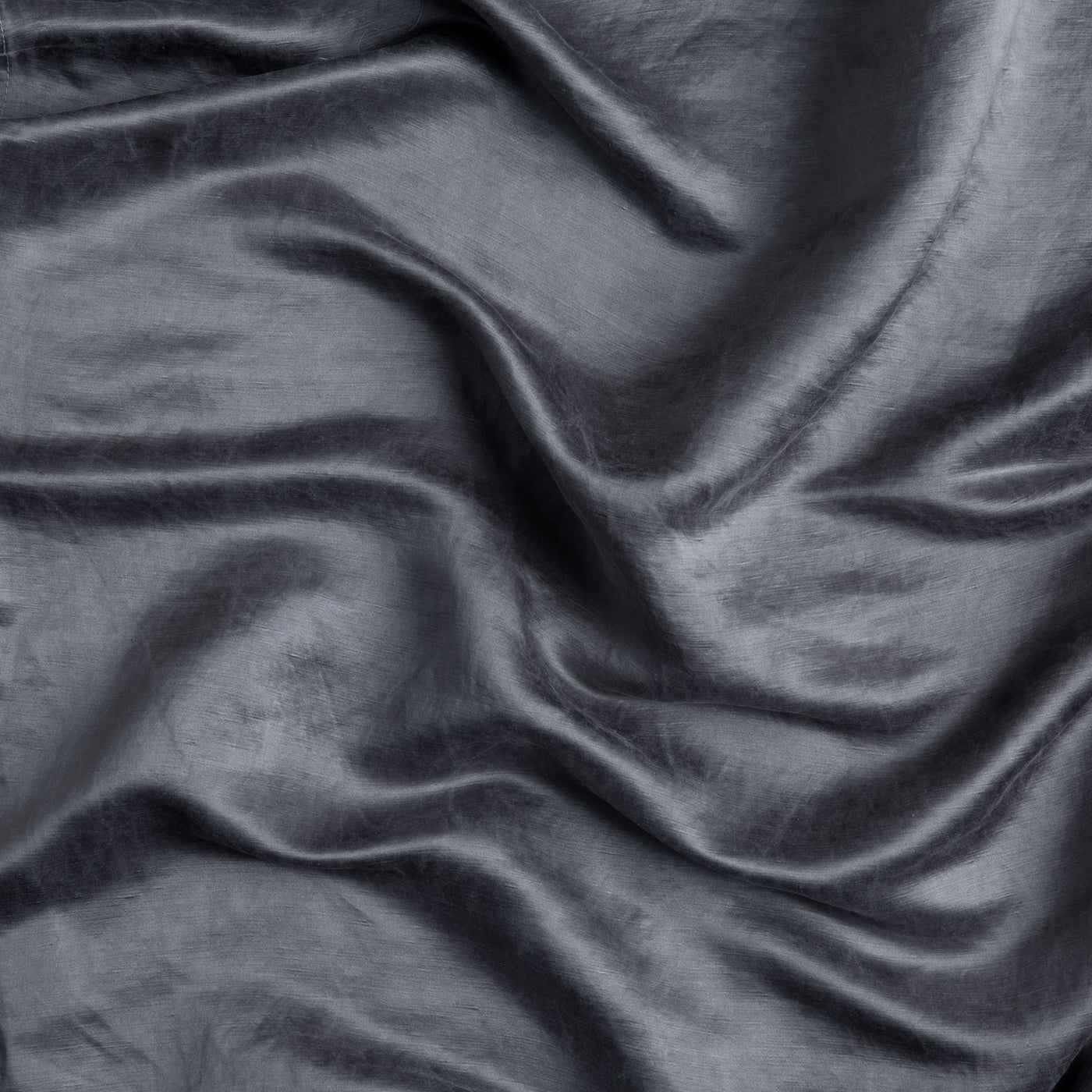 Close-up of draped French Lavender Paloma fabric showing silky sheen and soft folds.