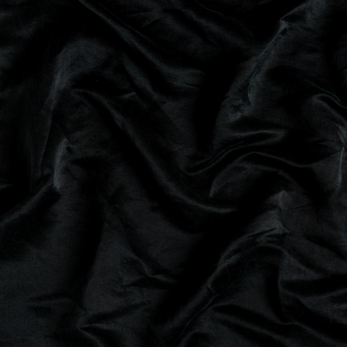 Close-up of Bella Notte Paloma pillowcase in Corvino, showing draped black velvet texture.