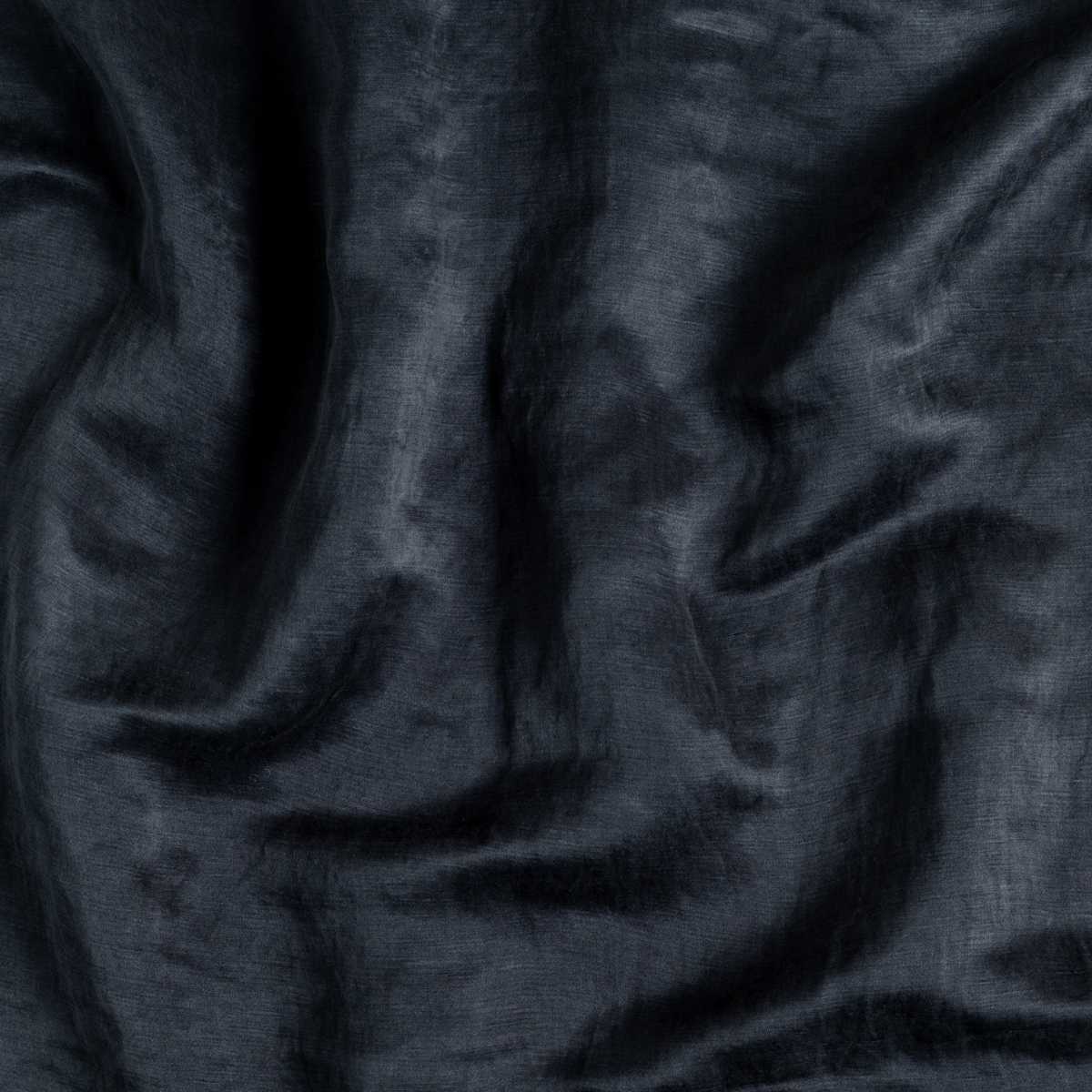 Close-up of Midnight Bella Notte Paloma duvet cover showing draped velvet texture.