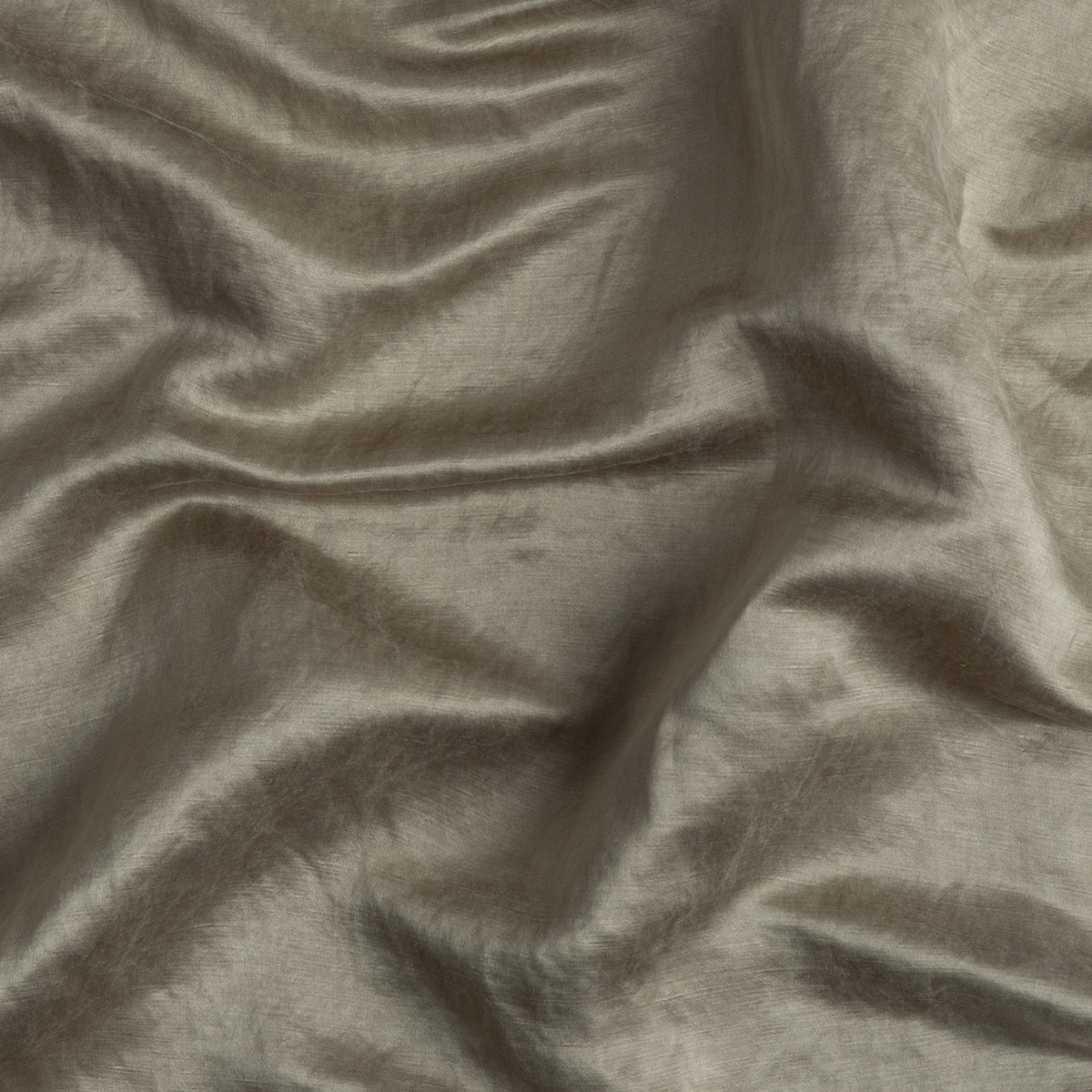 Close-up of Bella Notte Paloma fabric drape showing silky sheen and natural creasing.